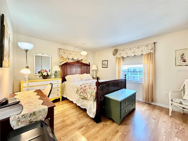 1633 Leisure Dr Unit M-37, Bradenton, FL 34207 - bedroom with baseboards and light wood-type flooring