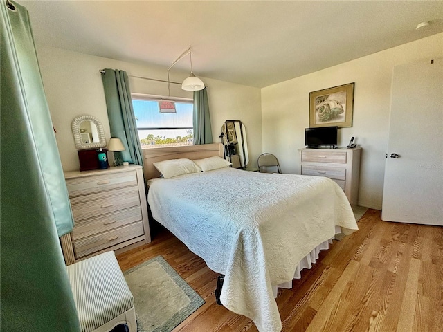 1633 Leisure Dr Unit M-37, Bradenton, FL 34207 - bedroom with light wood-style flooring