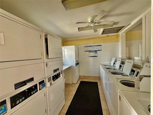 1633 Leisure Dr Unit M-37, Bradenton, FL 34207 - common laundry area featuring visible vents, stacked washer and clothes dryer, washer and clothes dryer, light tile patterned floors, and ceiling fan