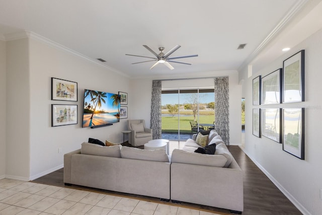 4606 Lake Fox Pl, Parrish, FL 34219 - living room featuring ornamental molding, wood finished floors, ceiling fan, and baseboards