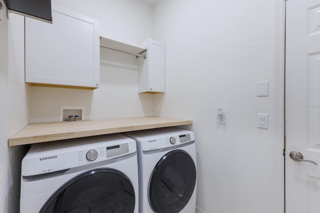 4606 Lake Fox Pl, Parrish, FL 34219 - laundry room featuring cabinet space and washer and clothes dryer