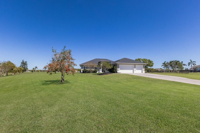 4606 Lake Fox Pl, Parrish, FL 34219 - ranch-style home featuring concrete driveway, a front yard, and a garage