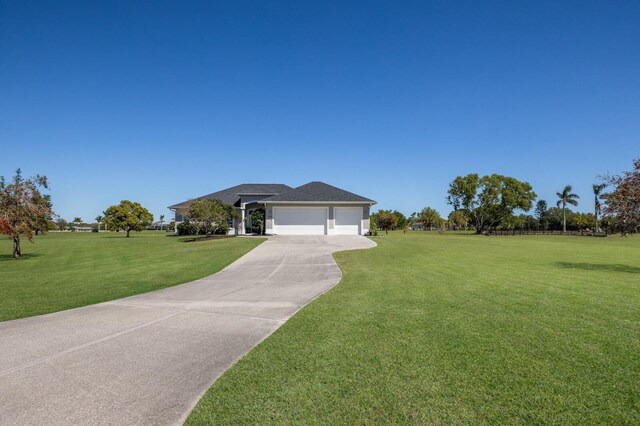 4606 Lake Fox Pl, Parrish, FL 34219 - single story home featuring a garage, a front yard, and driveway