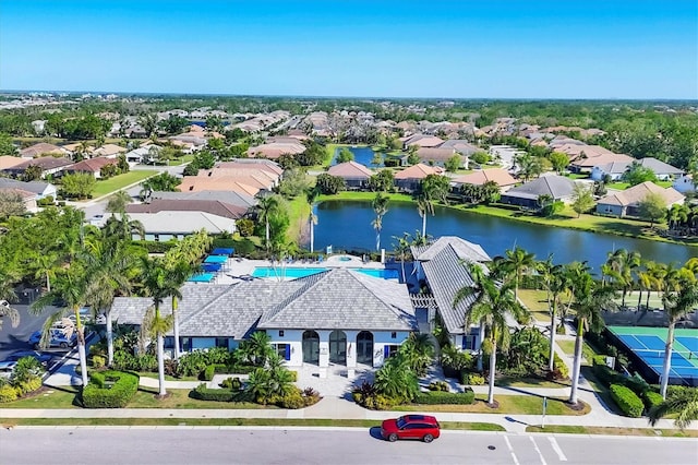 aerial view featuring a water view and a residential view