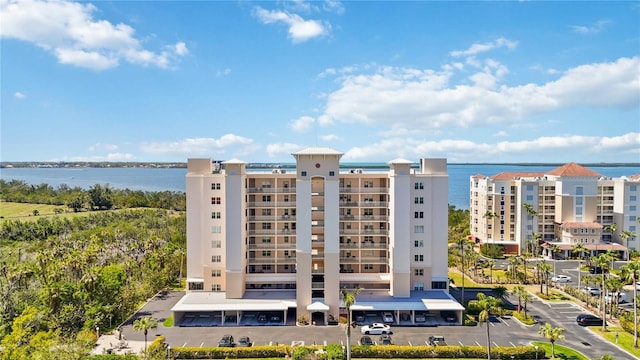 view of building exterior with a water view