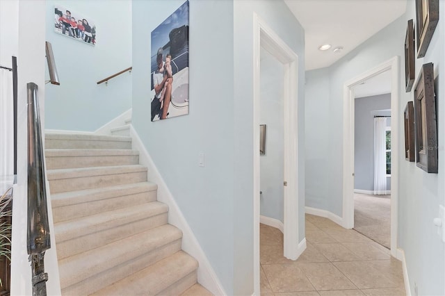 stairs featuring recessed lighting, tile patterned flooring, and baseboards