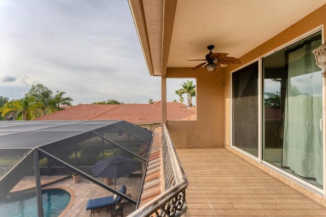 balcony featuring ceiling fan