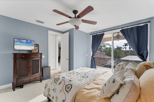 carpeted bedroom with access to outside, baseboards, visible vents, and ceiling fan