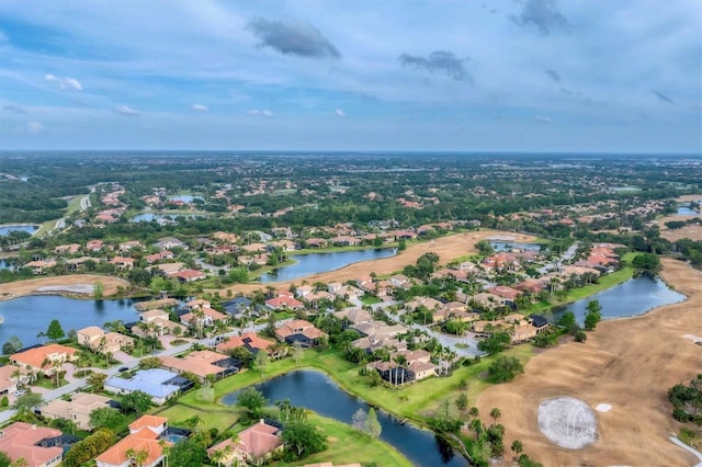 bird's eye view with a water view and a residential view