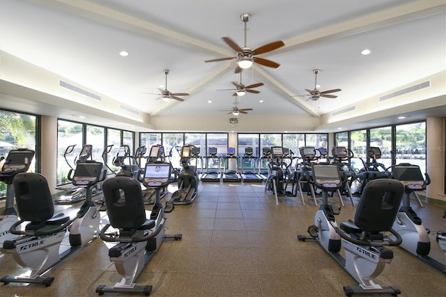 gym featuring visible vents, vaulted ceiling, and recessed lighting