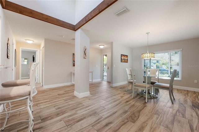 3804 Sun Eagle Ln, Bradenton, FL 34210 - dining space with baseboards, light wood-style floors, and visible vents