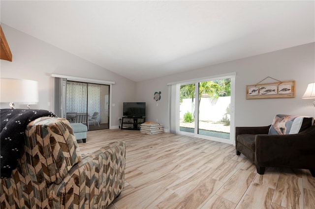 3804 Sun Eagle Ln, Bradenton, FL 34210 - living area with vaulted ceiling and light wood finished floors