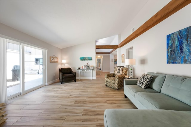 3804 Sun Eagle Ln, Bradenton, FL 34210 - living area with visible vents, baseboards, vaulted ceiling, and wood tiled floor