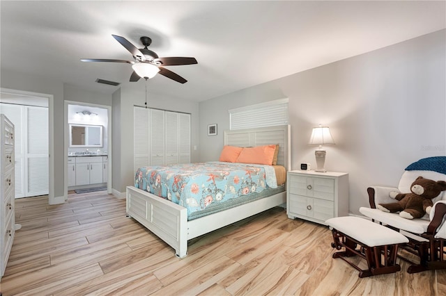 3804 Sun Eagle Ln, Bradenton, FL 34210 - bedroom featuring a sink, light wood-style flooring, visible vents, and ceiling fan