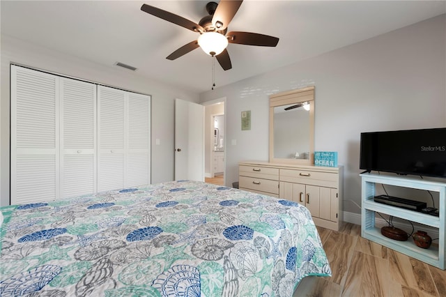 3804 Sun Eagle Ln, Bradenton, FL 34210 - bedroom featuring a ceiling fan, baseboards, a closet, and visible vents