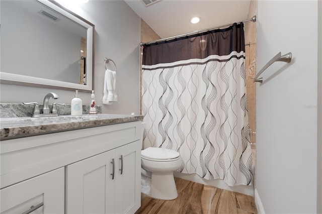3804 Sun Eagle Ln, Bradenton, FL 34210 - full bathroom featuring visible vents, toilet, vanity, and a shower with curtain