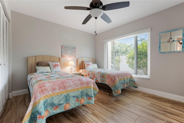 3804 Sun Eagle Ln, Bradenton, FL 34210 - bedroom featuring a ceiling fan, baseboards, and wood finished floors