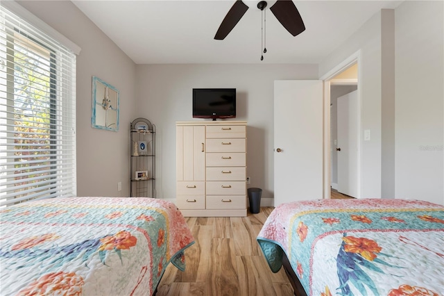 3804 Sun Eagle Ln, Bradenton, FL 34210 - bedroom with a ceiling fan and light wood-style floors