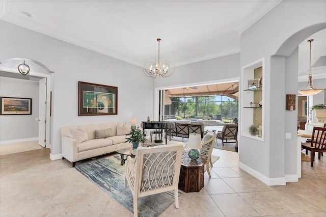 living room with baseboards, an inviting chandelier, ornamental molding, light tile patterned floors, and arched walkways