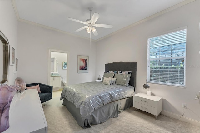 bedroom with ornamental molding, baseboards, ensuite bathroom, and light carpet