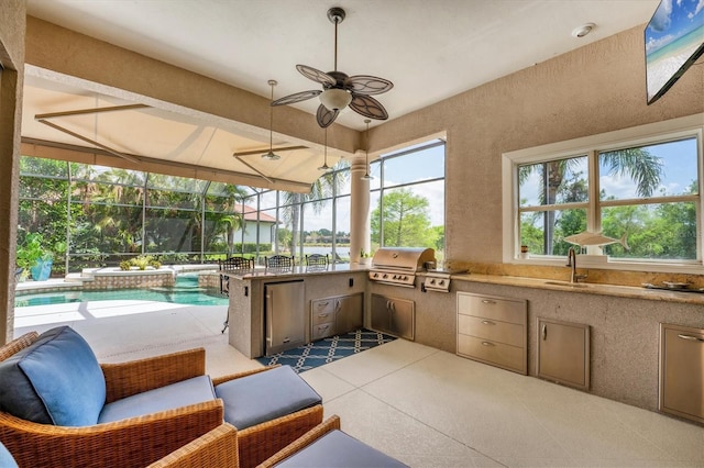 sunroom with a sink