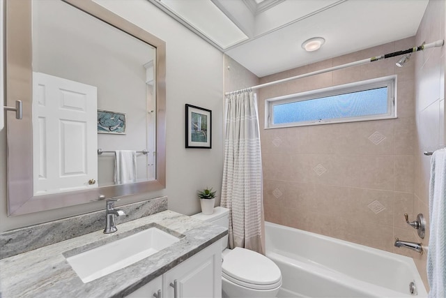 full bath featuring shower / bath combo, vanity, and toilet