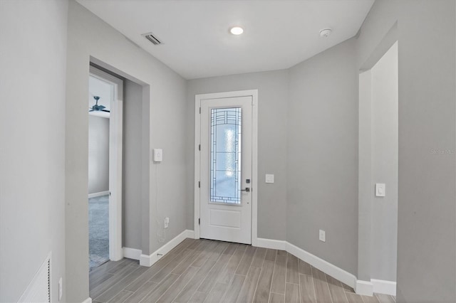 11717 Blue Hill Trl, Lakewood Ranch, FL 34211 - entryway with light wood-style floors, visible vents, and baseboards