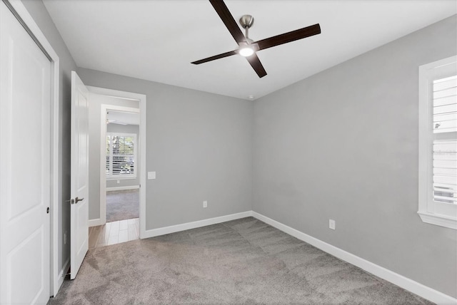 11717 Blue Hill Trl, Lakewood Ranch, FL 34211 - unfurnished bedroom featuring baseboards, carpet, and a ceiling fan