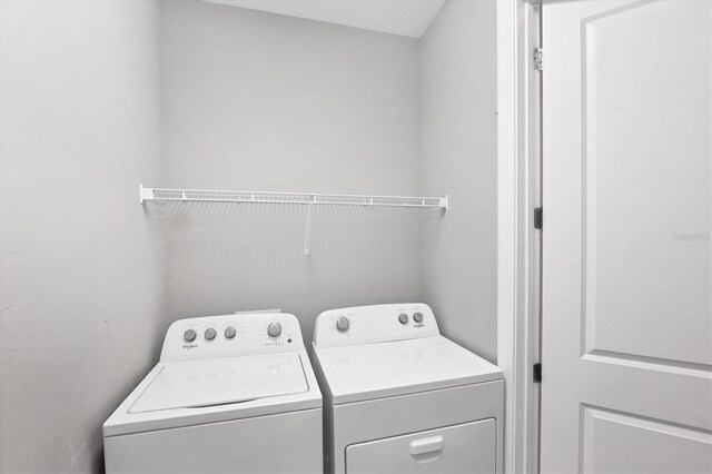 11717 Blue Hill Trl, Lakewood Ranch, FL 34211 - laundry room featuring laundry area and washing machine and clothes dryer