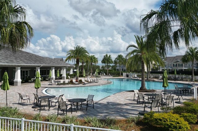 11717 Blue Hill Trl, Lakewood Ranch, FL 34211 - community pool with a patio area and fence