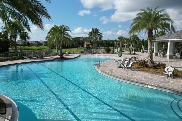 11717 Blue Hill Trl, Lakewood Ranch, FL 34211 - pool with a patio area and fence