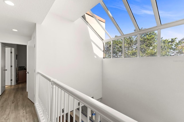 1928 Harbourside Dr Unit 1403, Longboat Key, FL 34228 - corridor with wood finished floors and recessed lighting