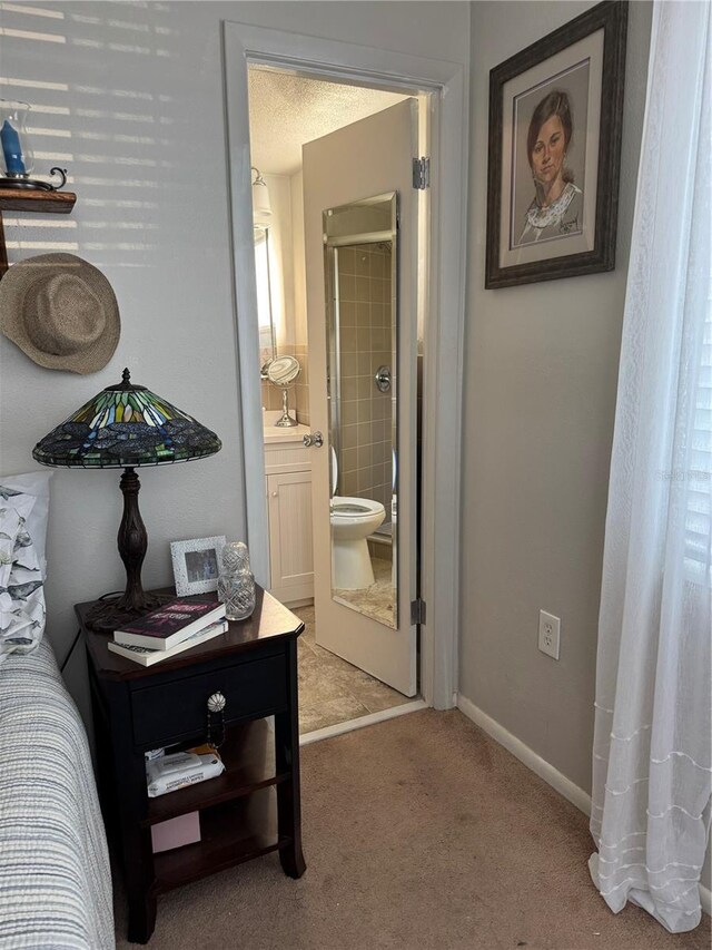 2330 Canal Dr Unit G27, Bradenton, FL 34207 - corridor with light colored carpet and baseboards
