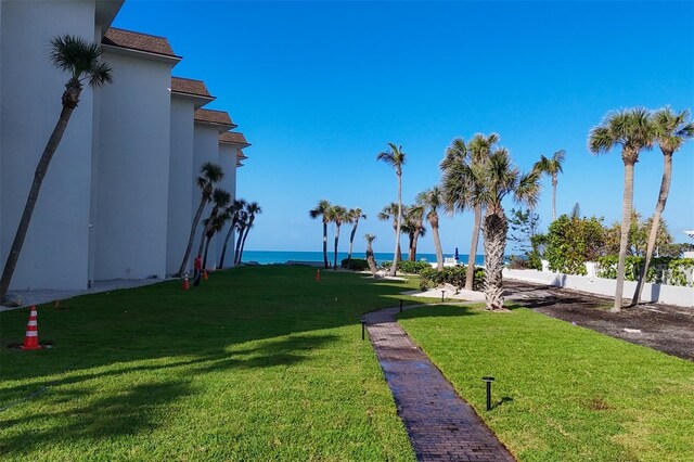 2100 Benjamin Franklin Dr Unit 104, Sarasota, FL 34236 - view of yard featuring a water view