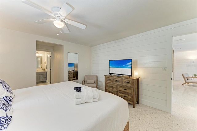 bedroom with ensuite bathroom and ceiling fan