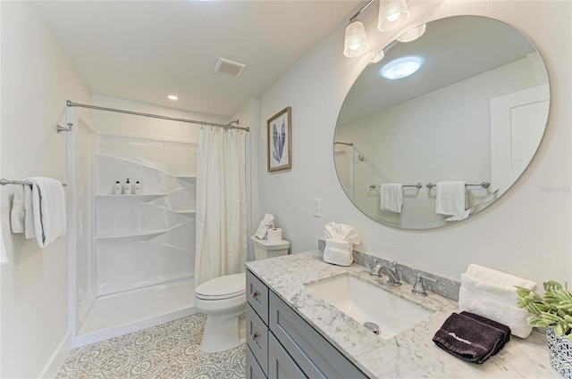bathroom with visible vents, curtained shower, toilet, and vanity
