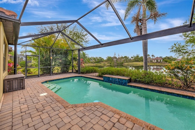 12711 Del Corso Loop, Bradenton, FL 34211 - swimming pool featuring a water view, a patio, and glass enclosure