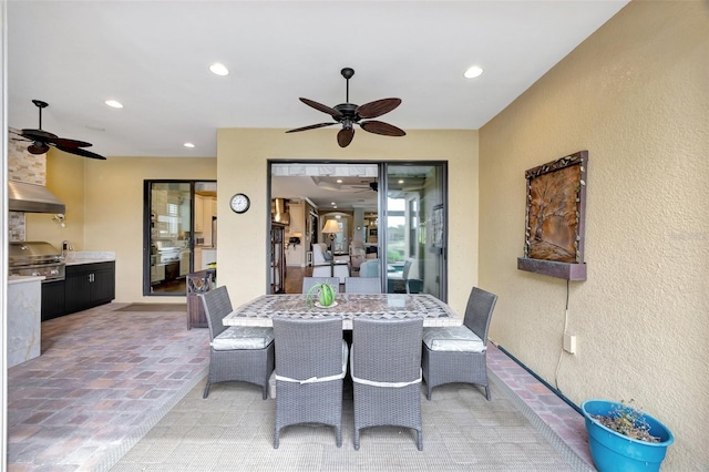 12711 Del Corso Loop, Bradenton, FL 34211 - dining room with a ceiling fan, recessed lighting, and a textured wall
