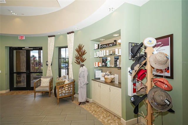 12711 Del Corso Loop, Bradenton, FL 34211 - hallway with french doors, baseboards, and recessed lighting