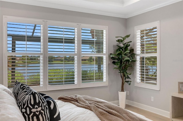 12711 Del Corso Loop, Bradenton, FL 34211 - bedroom featuring a water view, wood finished floors, and ornamental molding