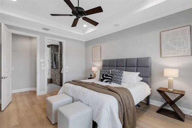 12711 Del Corso Loop, Bradenton, FL 34211 - bedroom with light wood-type flooring, a raised ceiling, ornamental molding, ceiling fan, and recessed lighting