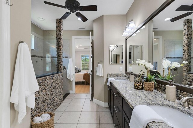 12711 Del Corso Loop, Bradenton, FL 34211 - ensuite bathroom with ceiling fan, double vanity, walk in shower, tile patterned floors, and recessed lighting