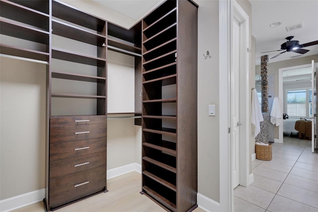12711 Del Corso Loop, Bradenton, FL 34211 - walk in closet with a ceiling fan and light tile patterned flooring