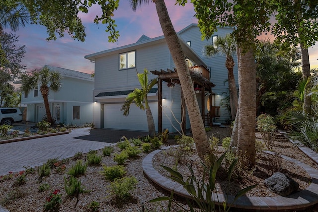 view of front of property with a garage and driveway