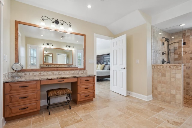 bathroom with ensuite bathroom, baseboards, walk in shower, vanity, and recessed lighting