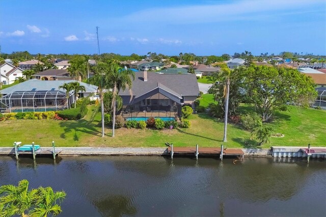 4704 Coral Lake Dr, Bradenton, FL 34210 - aerial view featuring a water view and a residential view