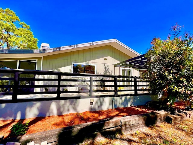 view of side of property with a chimney
