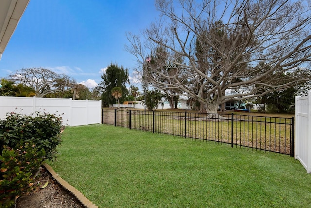 view of yard featuring a fenced backyard