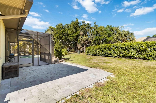 1118 Deardon Dr, Venice, FL 34292 - view of yard with glass enclosure and a patio area