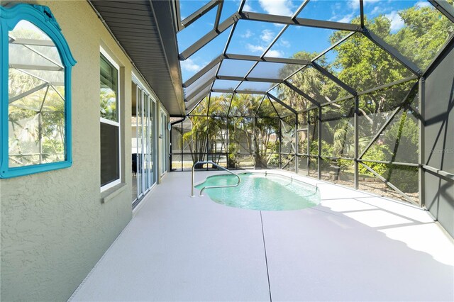 1118 Deardon Dr, Venice, FL 34292 - pool with glass enclosure and a patio area